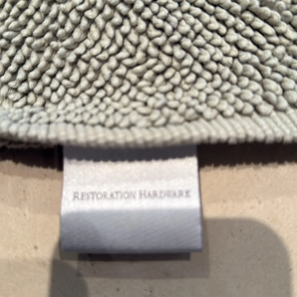 Restoration Hardware bath mat. Gently used. Has one small faded spot.